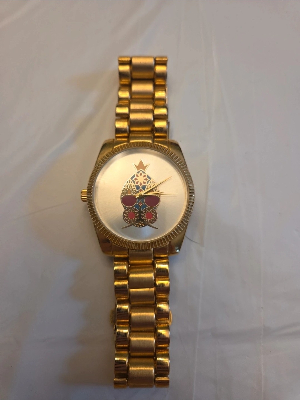 Gold-Tone Women's Watch with Decorative Pomagranite Dial